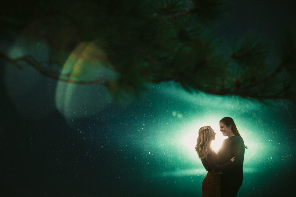 Engaged Colorado LGBTQ couple embracing in Boulder Mountain Parks.